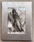 Here it is in one of my brushed metal frames